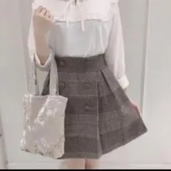 《evelyn》くるみボタンチェックスカート