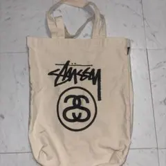 STUSSY ドローストリングバッグ ホワイト - メルカリ