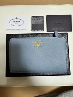 美品　PRADA 二つ折り財布 ライトブルー　1M1225
