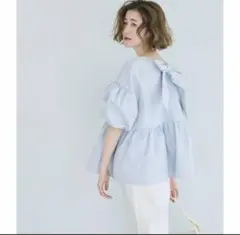 パリフワバックリボンペプラムトップス