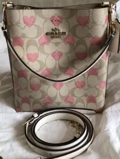 新品未使用COACH  コーチハートプリント　シグネチャー　モリーバケットバッグ