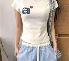aeae Tシャツ ホワイト トップス カットソー 韓国 ロゴ ハート