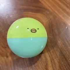 カプセルトイ 緑と水色の丸いキャラクター