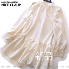 新品NICE CLAUP バックリボンフレアチュニックブラウス/PBE