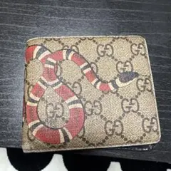 GUCCI蛇デザイン 二つ折り財布 ブラック - メルカリ