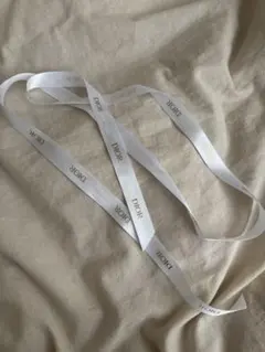 Dior ホワイトリボン ゴールドロゴ