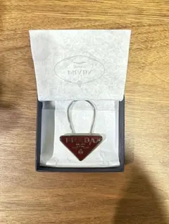 PRADA ダークネイビー ブラック レザー キーホルダー2本セット - メルカリ