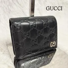 ✨高級✨ グッチ 二つ折り財布 シマ ドリアン GG柄 レザー シグネチャー 黒