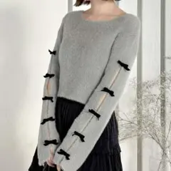 clear 袖リボン付き ラメ フェザーニット トップス