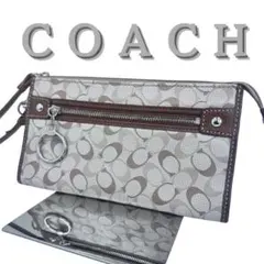 コーチ シグネチャー C ウォレット/リストレット ベージュ/ブラウン