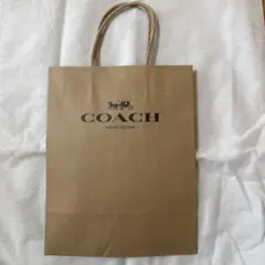 COACH 紙袋 茶色 ロゴ入り