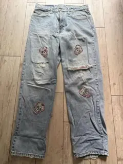 スカル刺繍入りデニムパンツのサムネイル