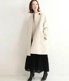 値下げ　IENA ボトルネックトラペーズコート　ノーカラー　膝下丈　ホワイト IENA（イエナ）の「ボトルネックトラペーズコート◇（）」 - WEAR