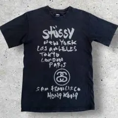 STUSSY × KAWS World Tour Tシャツ