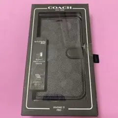 新品 COACH iPhone13pro 用 手帳型 シグネチャーブラック - メルカリ