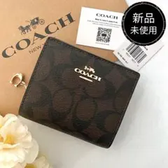 新品　正規品☆COACH コーチ　折り財布　メンズ　ブラウン　二つ折り財布のサムネイル
