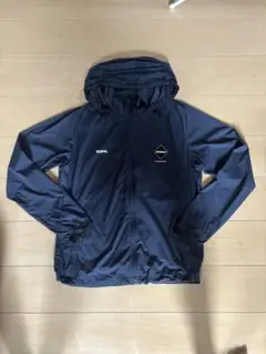 FC REAL Bristol M ネイビー フード付きジャケット　ナイロン 新品 未使用】F C Real Bristol ブリストル 3LAYER WARM UP