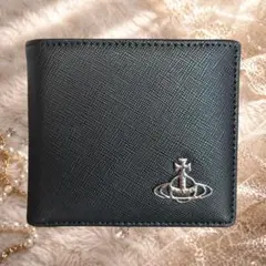 新品・未使用 Vivienne Westwood 二つ折り財布ブラック箱・袋付きのサムネイル