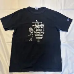 Stüssy ブラック Tシャツ Champion