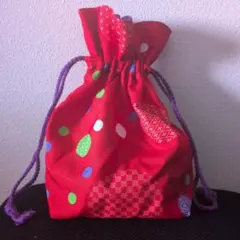 赤いドット模様の和装用バッグ