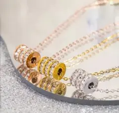 金アレ 【爆売れ】リング✨cz3柱ダイヤ 高級 サージカルステンレス ネックレス