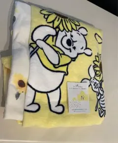 新品タグ付き⭐︎くまのプーさん　フードタオルのサムネイル
