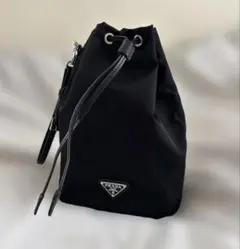 ももさん専用 PRADA re-nylon 巾着ポーチ　ブラック　値下げ可 ももさん専用 PRADA re-nylon 巾着ポーチ ブラック 値下げ可 - メルカリ