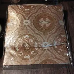 日本の絹 袋帯 金色と白の花模様