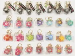 【新品未開封】ミャクミャクサンリオクリア推しカラー黒パステルキーホルダー4種