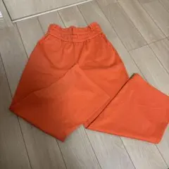 オレンジ色 ゴムウエスト 長ズボン