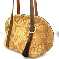 帯リメイク葡萄柄マスタードイエロー　シェル型ボストンショルダーバッグ　タッセル付