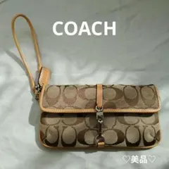 ☆COACH☆ クラッチバッグ ポーチ がま口 シグネチャー ピンク