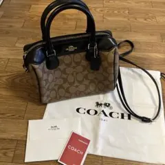 COACH ショルダーバッグ ブラウン/ブラック シグネチャー レザーチャーム付