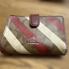 COACH 二つ折り財布 赤 ベージュのサムネイル