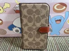 COACH iPhone14 手帳型ケース シグネチャーカーキ - メルカリ