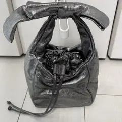 kate spade ケイトスペード　リボン　　　ミニハンドバッグ　シルバー系