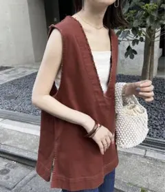 discoat  ディスコート　USコットンフリンジ深Vベスト