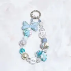 ハンドメイドキーホルダー　キーリング　ストラップ　手描きビーズ　水色　リボン