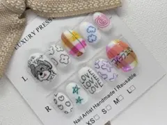 833.現品ネイルチップ　シュナウザーワンちゃんアニマルらくがき花柄ネイル