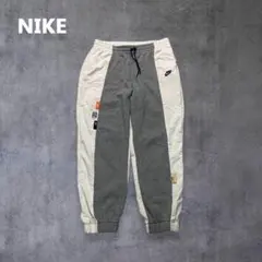 NIKEナイキアイコンクラッシュウーブンミックスドパンツ 異素材グレー白L 古着