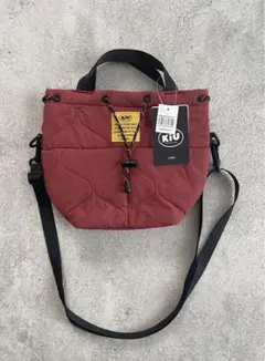 【新品】kiu キウ 2WAY 巾着ミニバッグ ショルダー付き 撥水 テラコッタ
