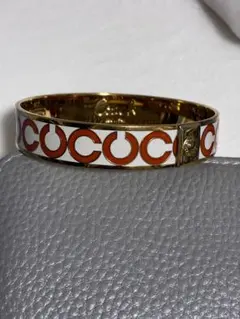 【COACH】コーチ エナメル バングル シグネチャー オレンジ×ホワイトのサムネイル