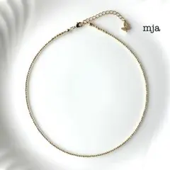 ゴールド　ビーズネックレス【蝶チャーム付】