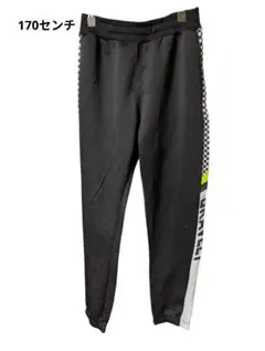 黒いチェック柄サイドラインロングパンツ