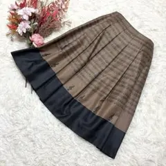 M'S GRACY ミュージック 総柄 タックスカート 茶 黒 7号【36】のサムネイル
