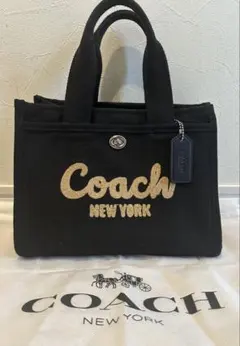 ✨中古品✨Coach ブラックカーゴトートバッグ リボン柄26サイズ長財布