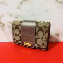 0009 COACH シグネチャー 古銭入れ ラウンドファスナー 折り財布