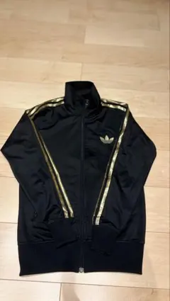 adidas トレフォイル ジャージ ブラック ゴールドのサムネイル