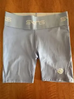 SKINS ライトブルー タイツ Mサイズのサムネイル