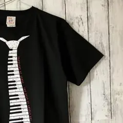 【未使用美品】クロス&ステッチ×アンジェラアキ ピアノタイ ライブTシャツ 黒Mのサムネイル